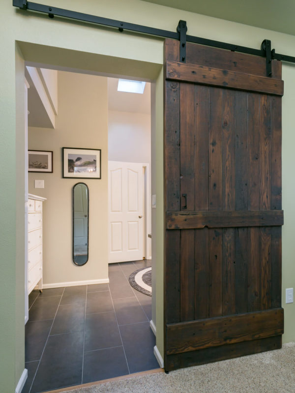 interior barn door to addition by licensed general contractors