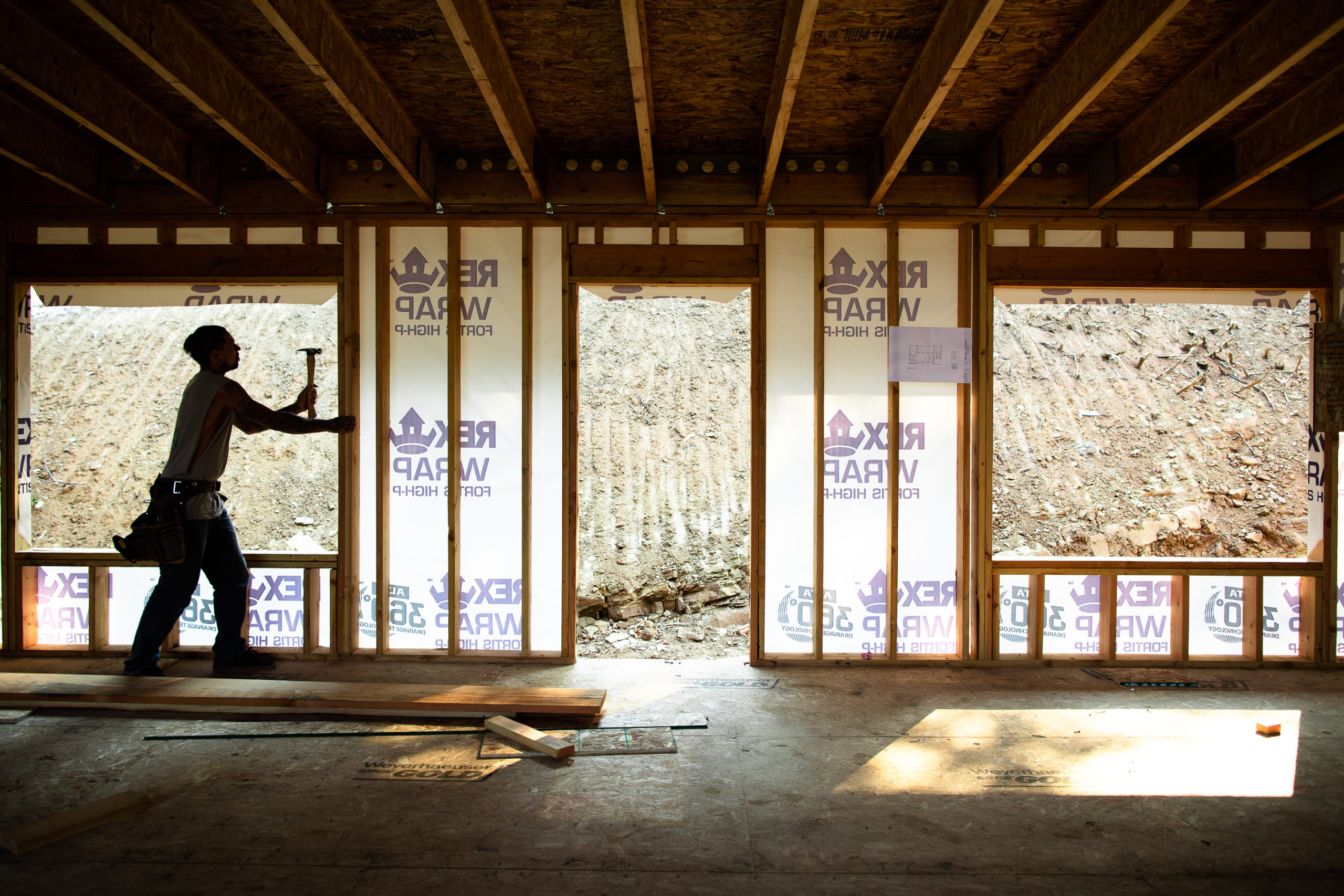 Interior of framing stage of a project by Verity Construction, custom home builder in Medford, OR