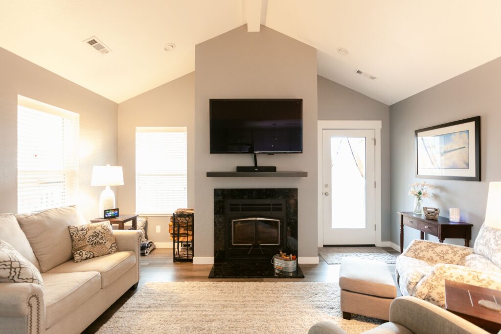 Living room and communal area in a custom built farmhouse style energy efficient home in Oregon